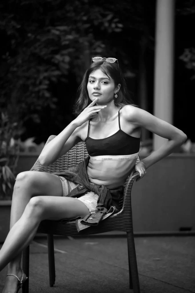 Powerful female portrait with relaxed pose and strong eye contact